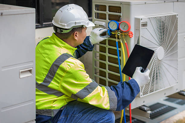 Professional Heat Pump Repair technician working in Ozona, FL